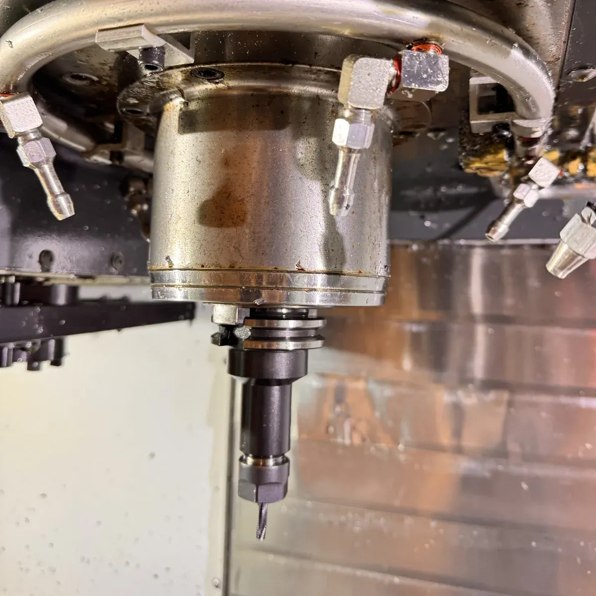 Close up of the Haas spindle and tool inside the machine enclosure