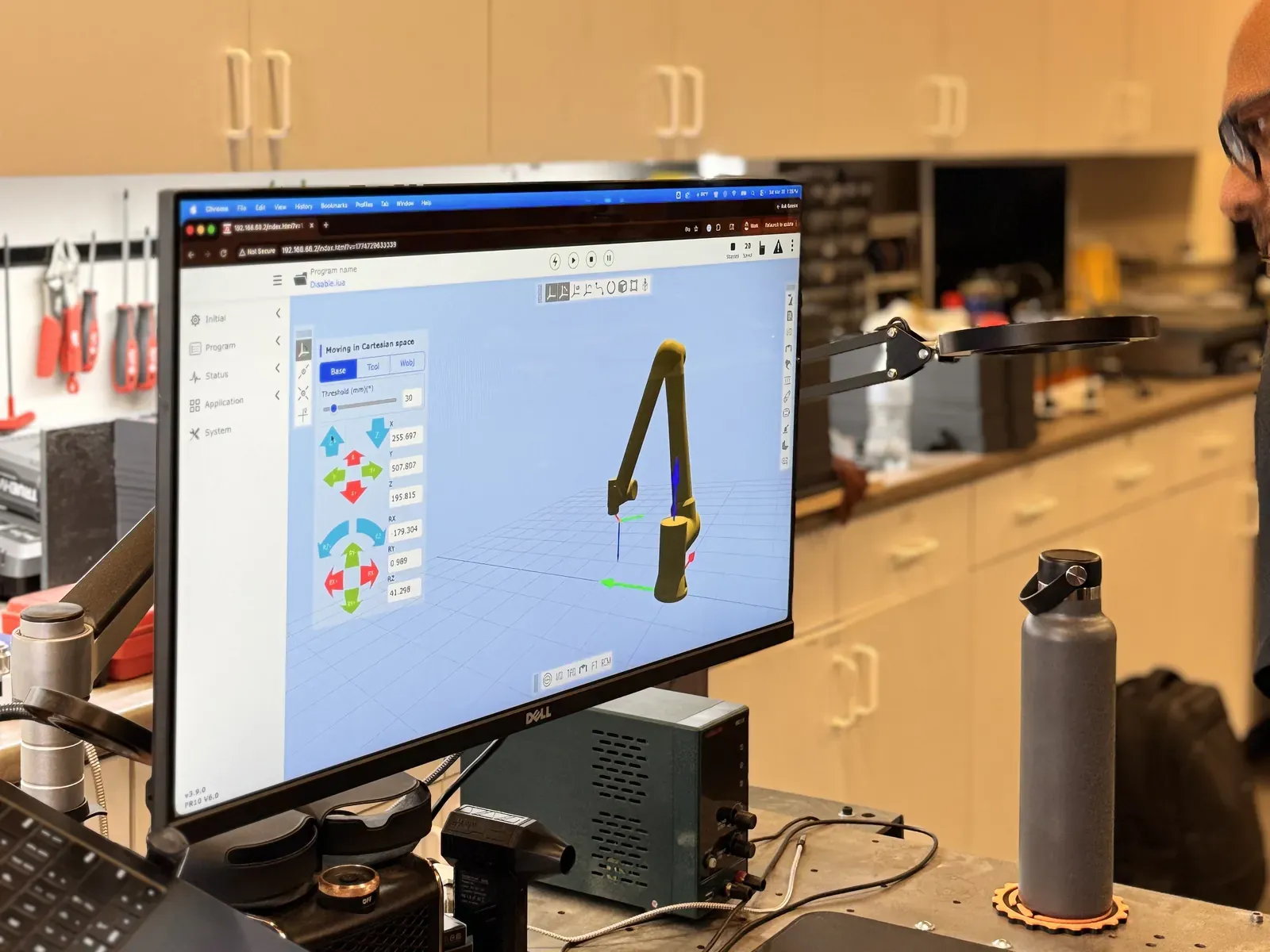 Robot arm design software on a monitor in the Axton Robotics lab